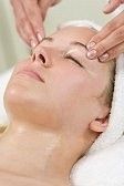 stock-images-a-young-woman-relaxing-at-a-health-and-beauty-spa-while-having-a-head-massage-or-facial-treatment-pixmac-64967943.jpg
